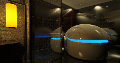 Users enjoying deep relaxation in the V-Max Float Pod with ambient LED lighting