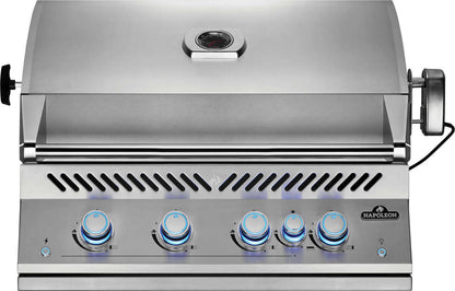 Stainless steel grill with control knobs on a white background